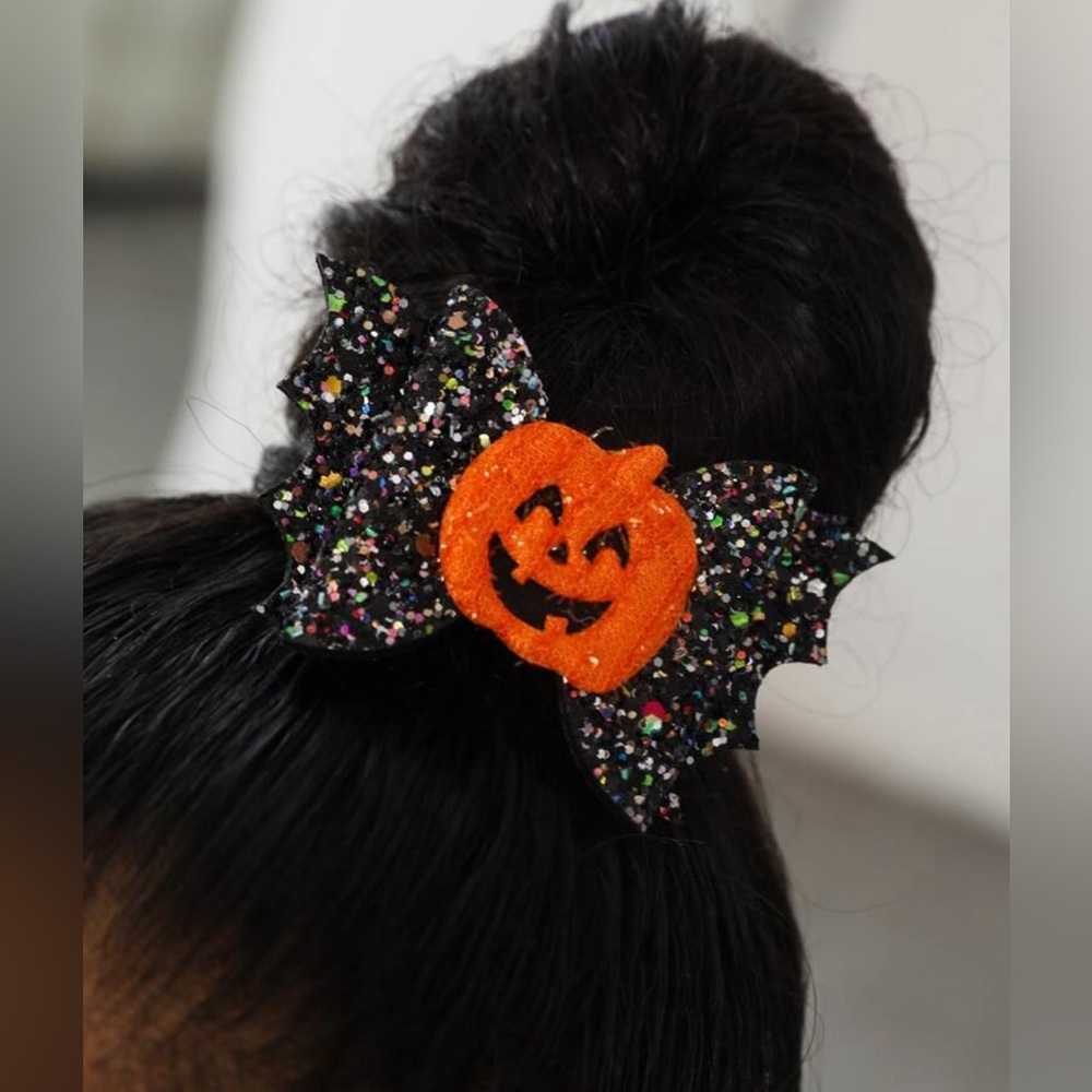 Halloween bat hair bow with black glitter wings and pumpkin alligator hair clip